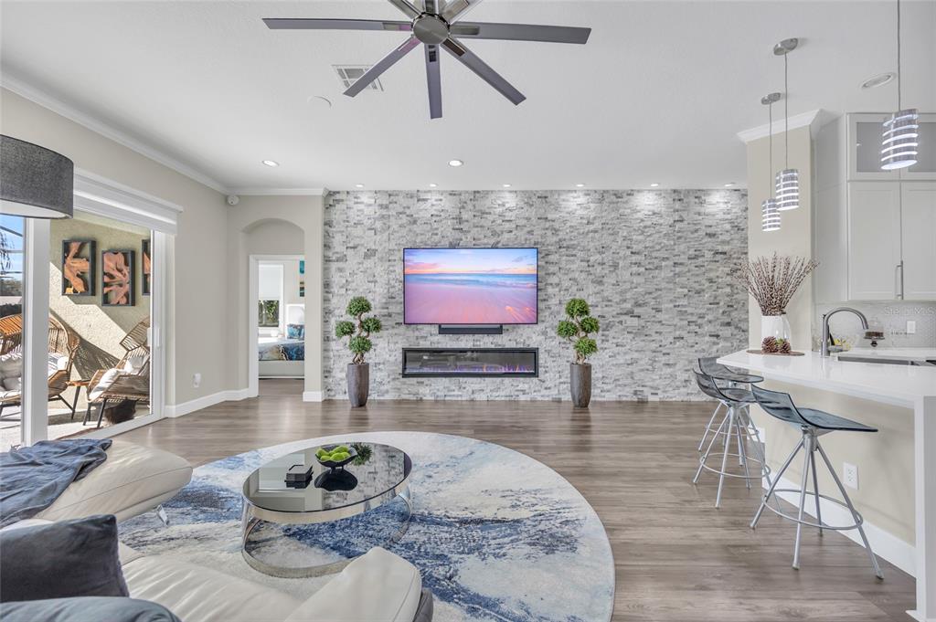 10600 Oakview Pointe Terrace Gotha, FL 34734 - Photo 15 of 44 a living room with furniture and a flat screen tv