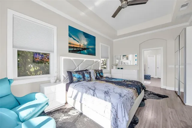 a bedroom with a bed and a couch