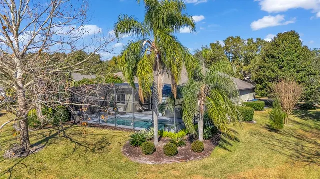 a view of swimming pool with a yard