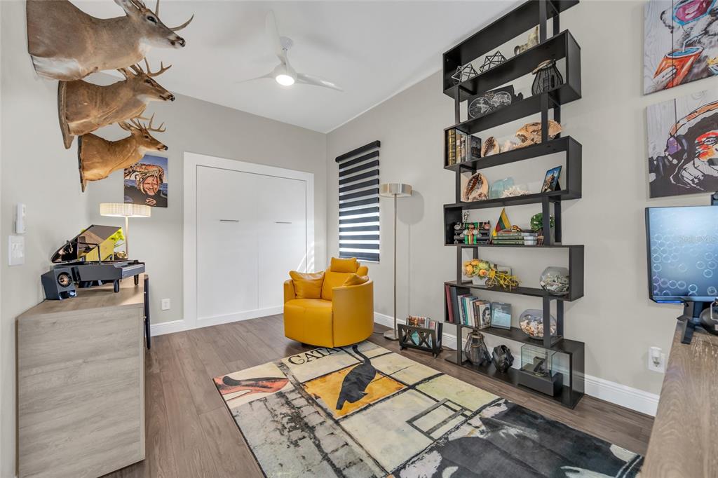 10600 Oakview Pointe Terrace Gotha, FL 34734 - Photo 26 of 44 a living room with furniture and a flat screen tv