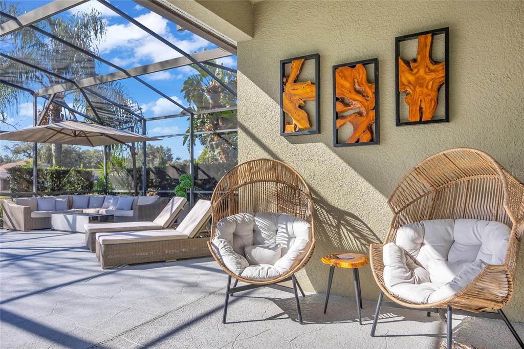 10600 Oakview Pointe Terrace Gotha, FL 34734 - Photo 31 of 44 a living room with furniture and a chandelier