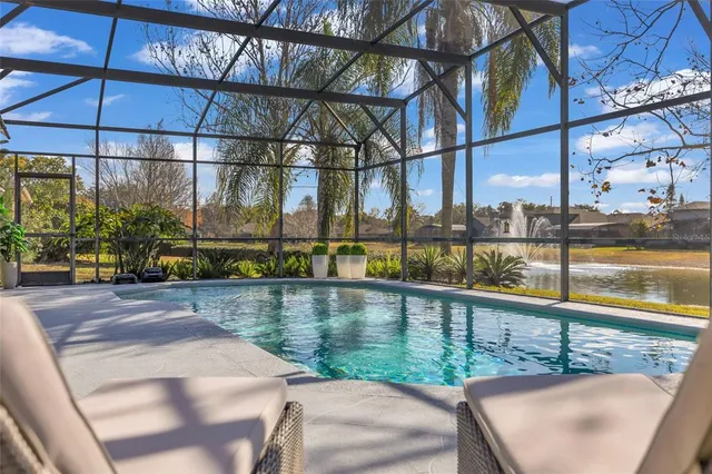 a view of a lake from a building from a balcony