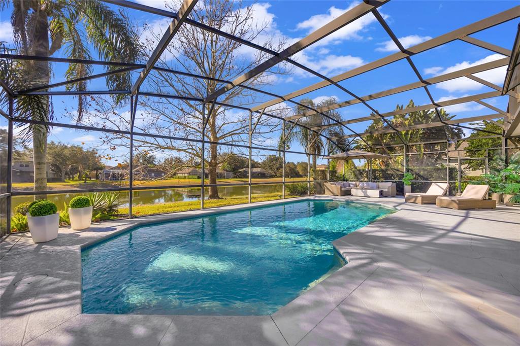 10600 Oakview Pointe Terrace Gotha, FL 34734 - Photo 37 of 44 a view of a swimming pool with a yard