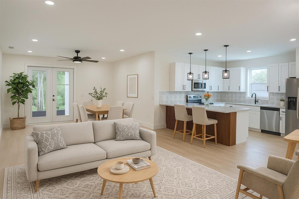 126 Canby Circle Spring Hill, FL 34606 - Photo 13 of 45 a large kitchen with cabinets table and chairs