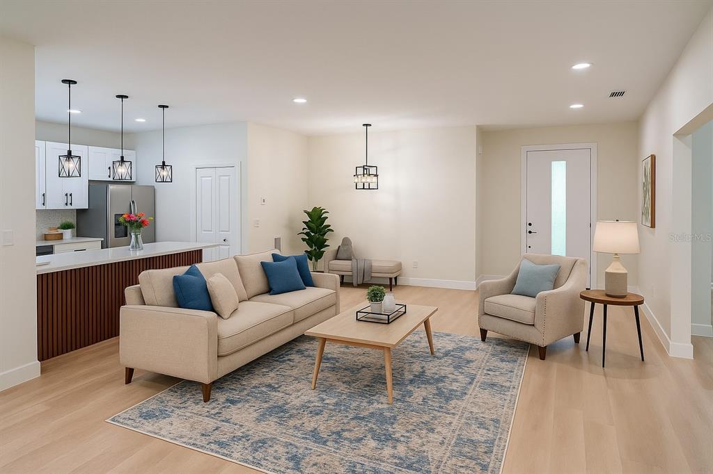 126 Canby Circle Spring Hill, FL 34606 - Photo 15 of 45 a living room with furniture and kitchen view