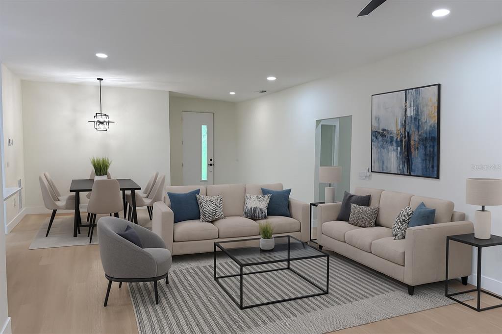 126 Canby Circle Spring Hill, FL 34606 - Photo 22 of 45 a living room with furniture and a wooden floor
