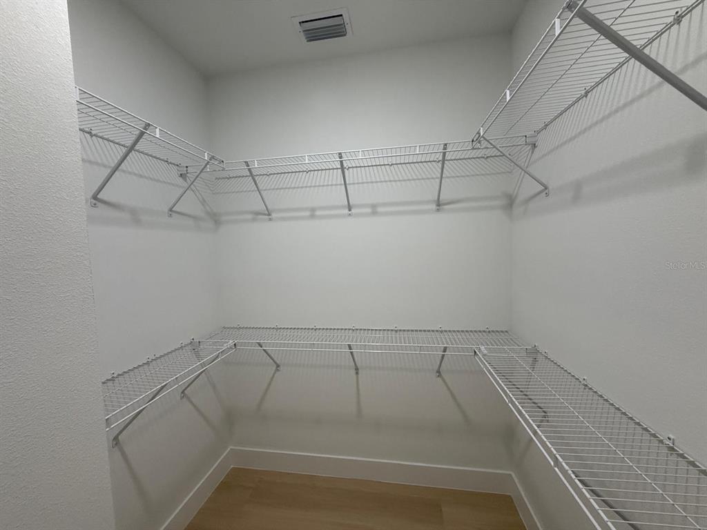 126 Canby Circle Spring Hill, FL 34606 - Photo 28 of 45 a view of a room with racks on the wall
