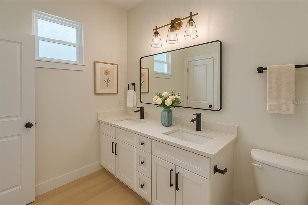 126 Canby Circle Spring Hill, FL 34606 - Photo 32 of 45 a bathroom with a sink and a mirror