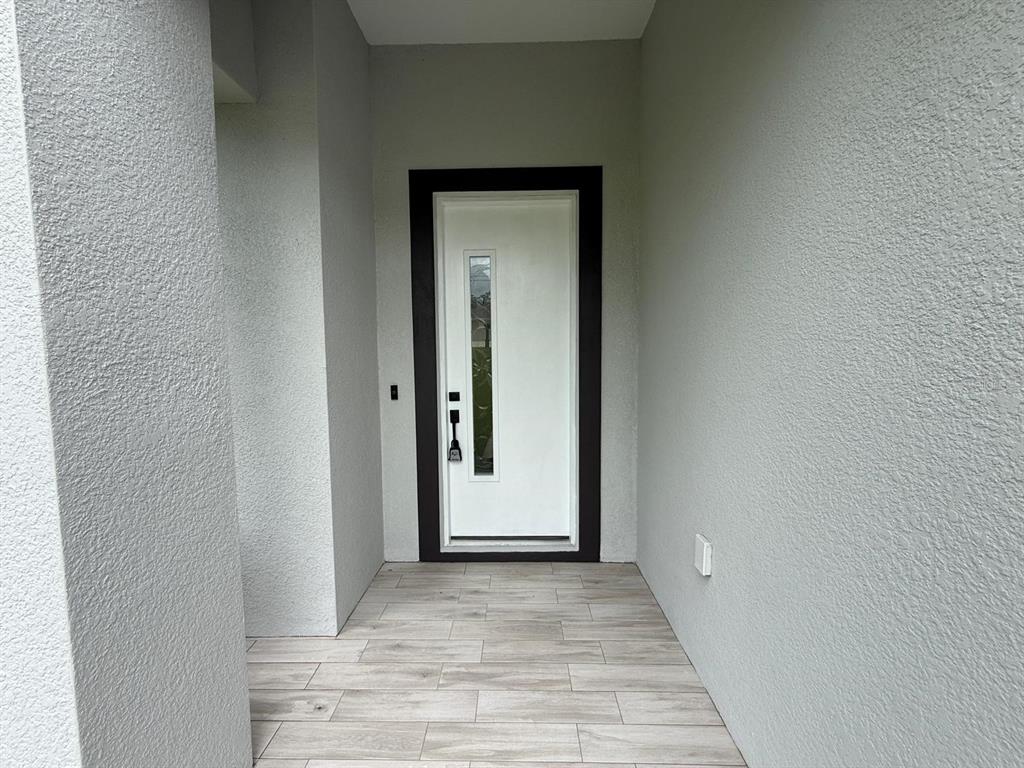 126 Canby Circle Spring Hill, FL 34606 - Photo 5 of 45 a view of an front door