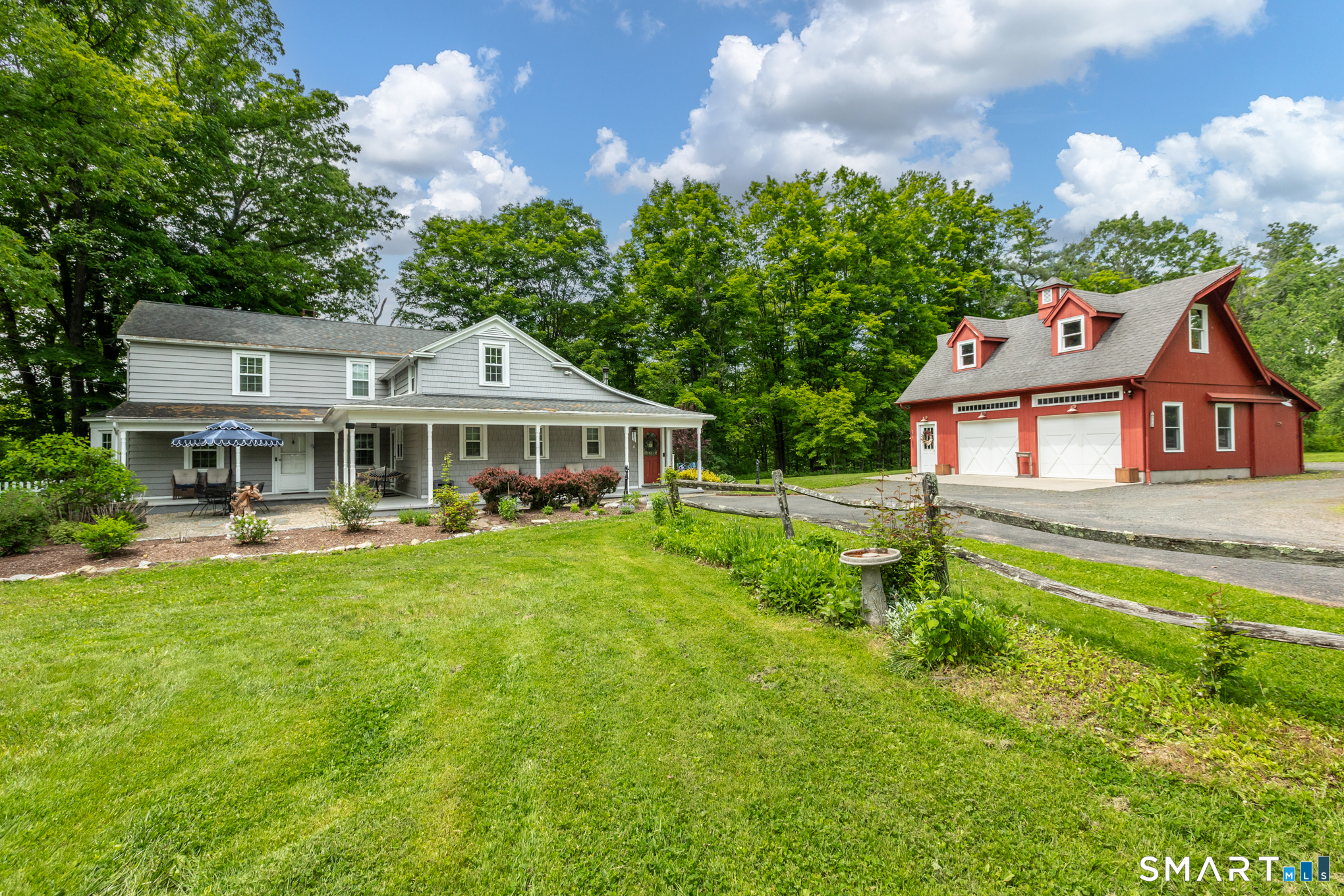 808 Branch Road Suffield, CT 06078 - Photo 1 of 40 a front view of house with yard and green space