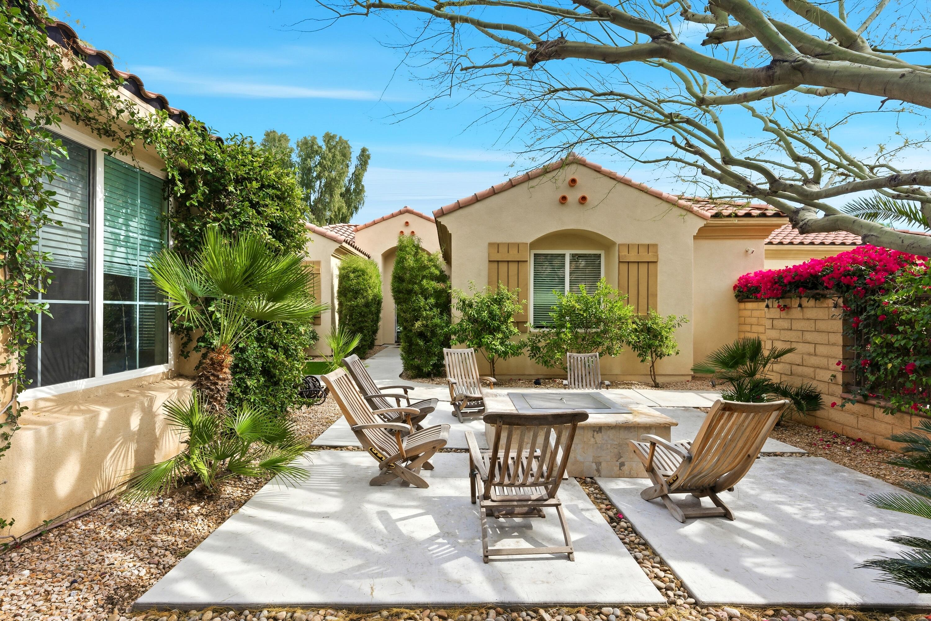 79120 Shadow Trail La Quinta, CA 92253 - Photo 17 of 60 a view of a house with backyard and sitting area