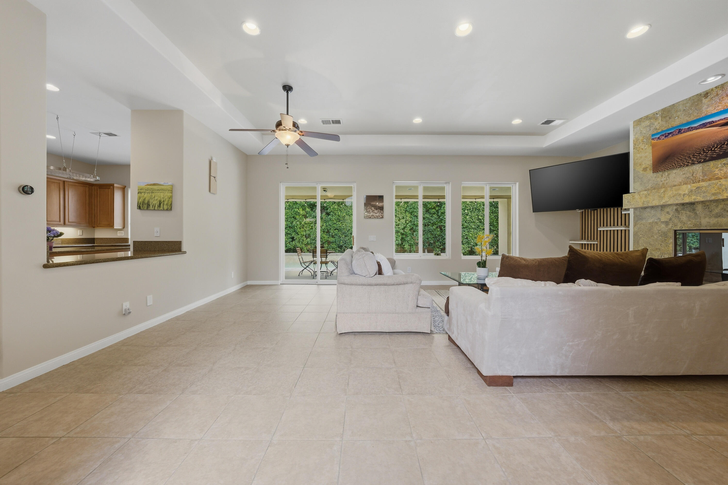 79120 Shadow Trail La Quinta, CA 92253 - Photo 21 of 60 a living room with furniture and a flat screen tv