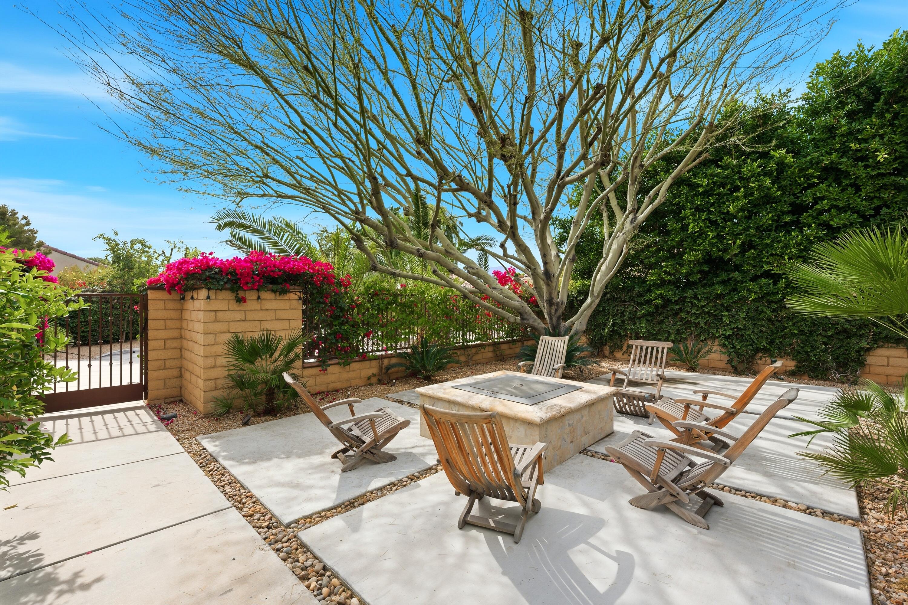 79120 Shadow Trail La Quinta, CA 92253 - Photo 32 of 60 a view of a backyard with sitting area and furniture
