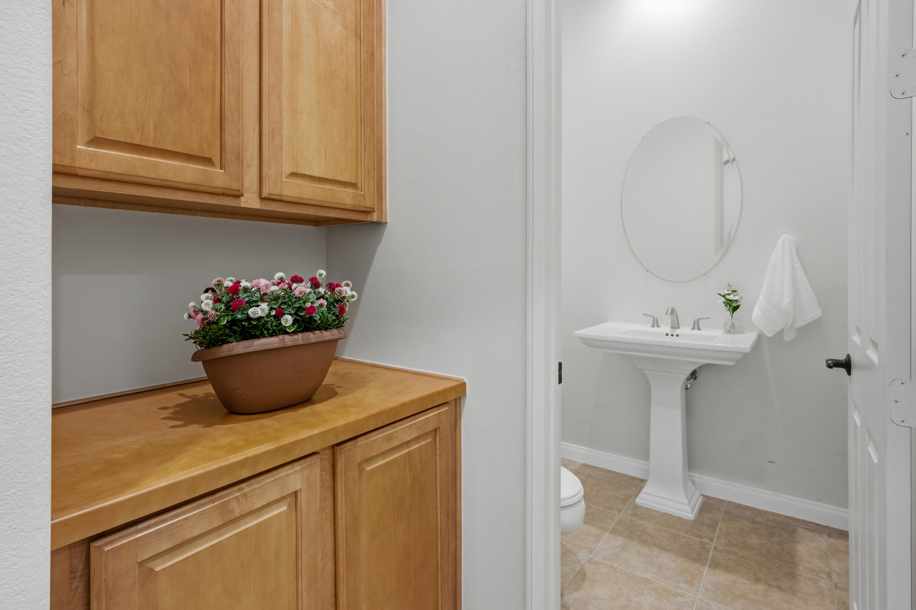 79120 Shadow Trail La Quinta, CA 92253 - Photo 33 of 60 a bathroom with a sink a vanity and a mirror