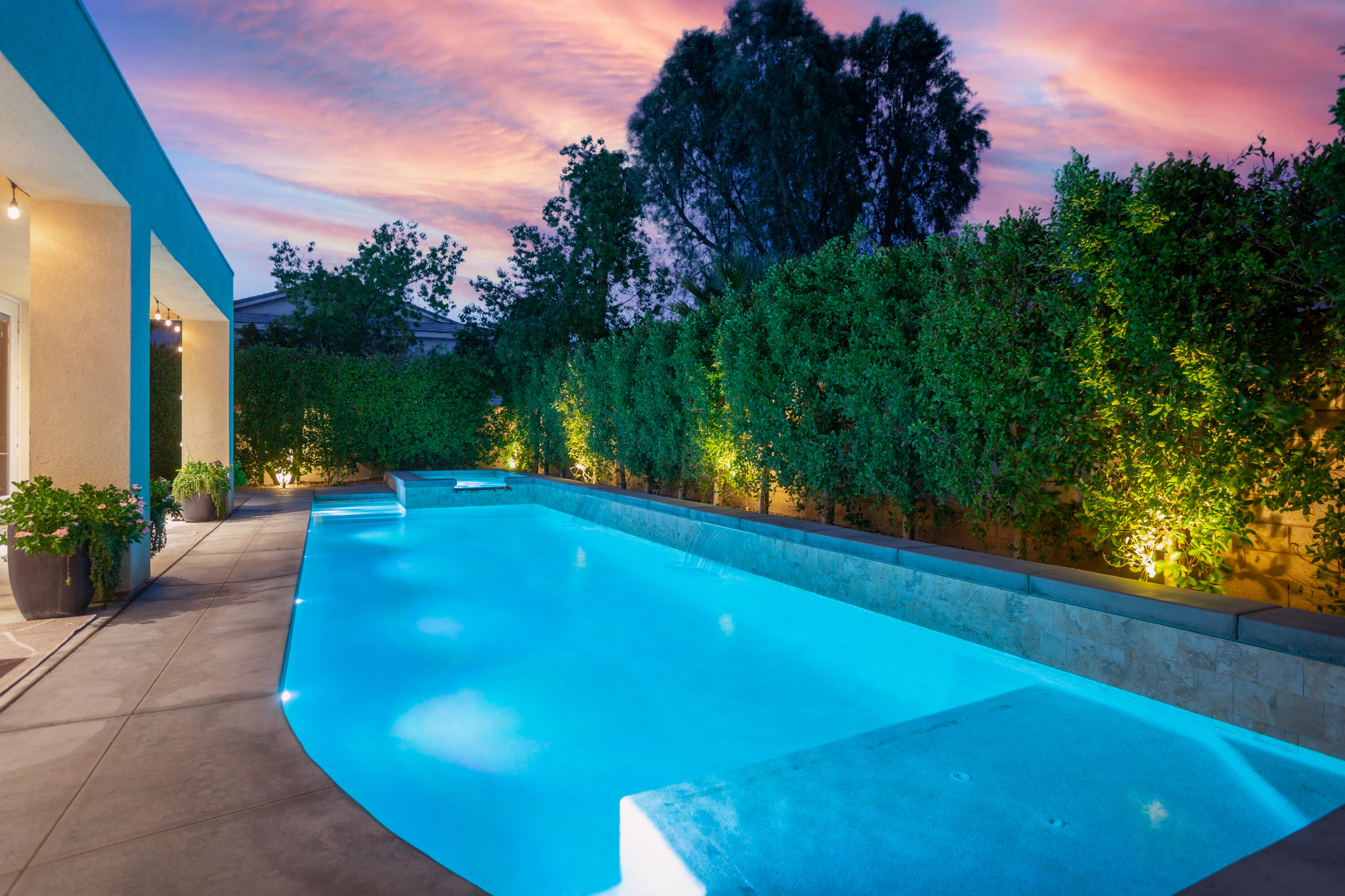 79120 Shadow Trail La Quinta, CA 92253 - Photo 4 of 60 a view of a swimming pool with a patio and plants