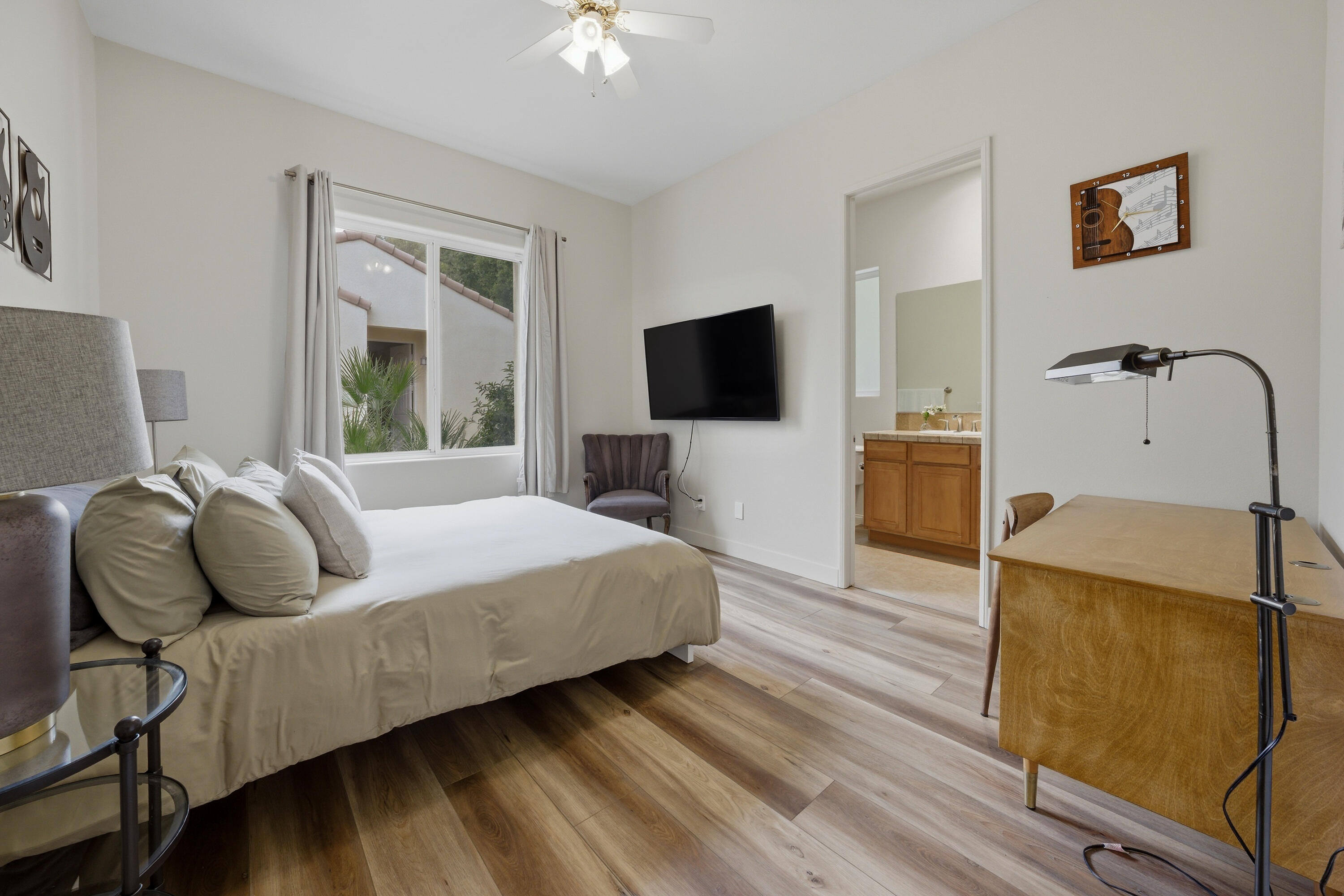 79120 Shadow Trail La Quinta, CA 92253 - Photo 41 of 60 a living room with furniture and a flat screen tv
