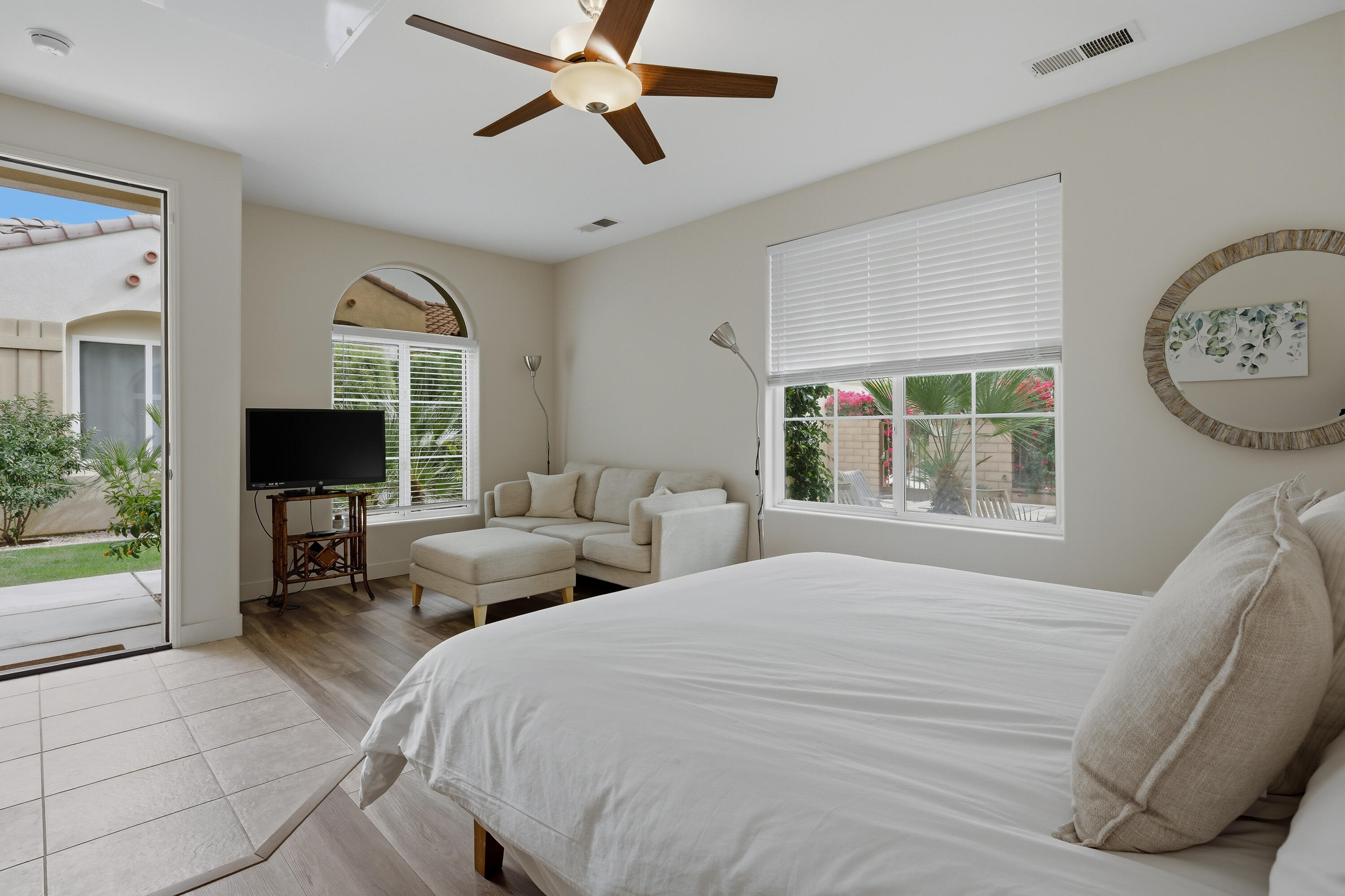 79120 Shadow Trail La Quinta, CA 92253 - Photo 50 of 60 a bedroom with furniture and a flat screen tv