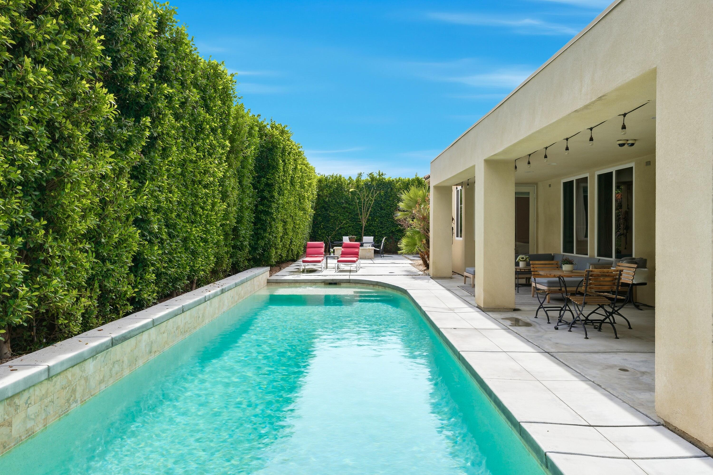 79120 Shadow Trail La Quinta, CA 92253 - Photo 56 of 60 a swimming pool with outdoor seating and yard