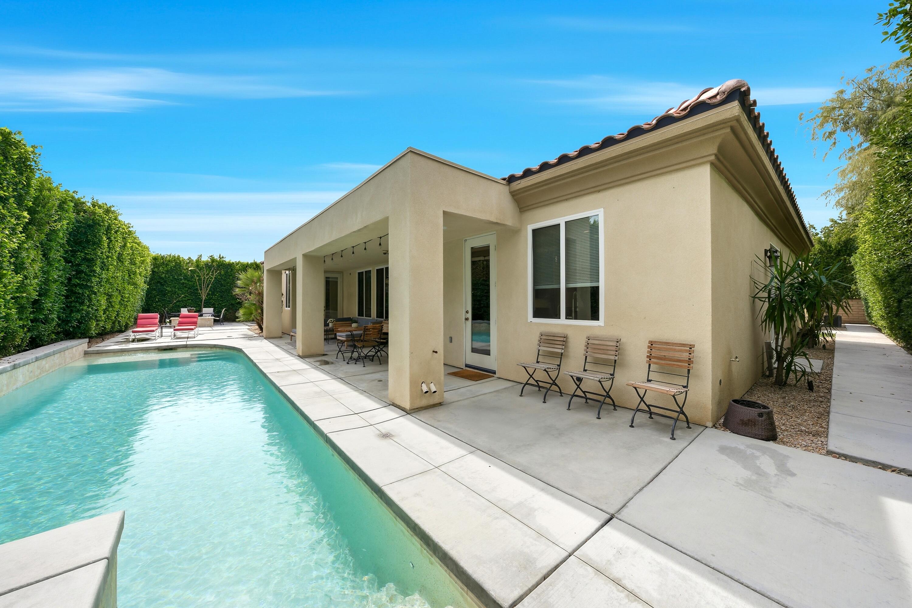 79120 Shadow Trail La Quinta, CA 92253 - Photo 57 of 60 a swimming pool with outdoor seating yard and porch