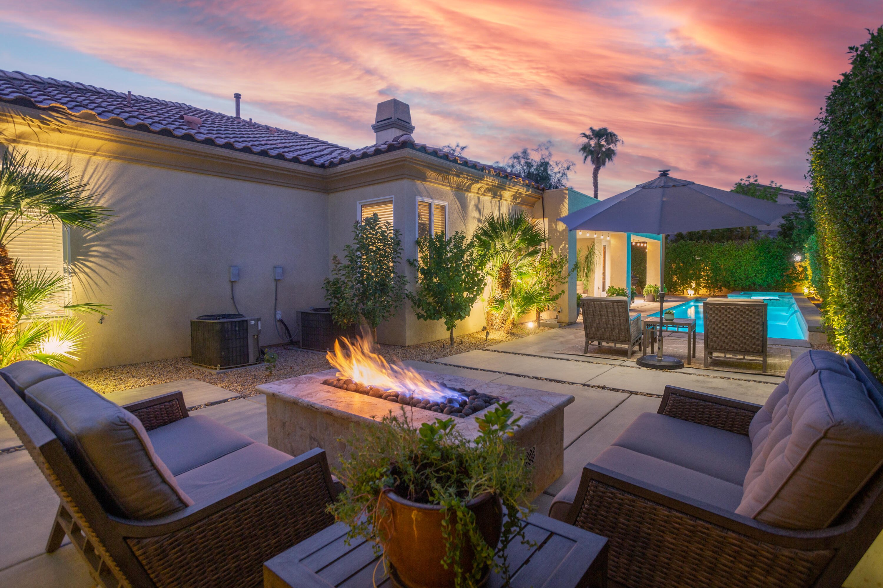 79120 Shadow Trail La Quinta, CA 92253 - Photo 7 of 60 a view of a chairs and table in the patio