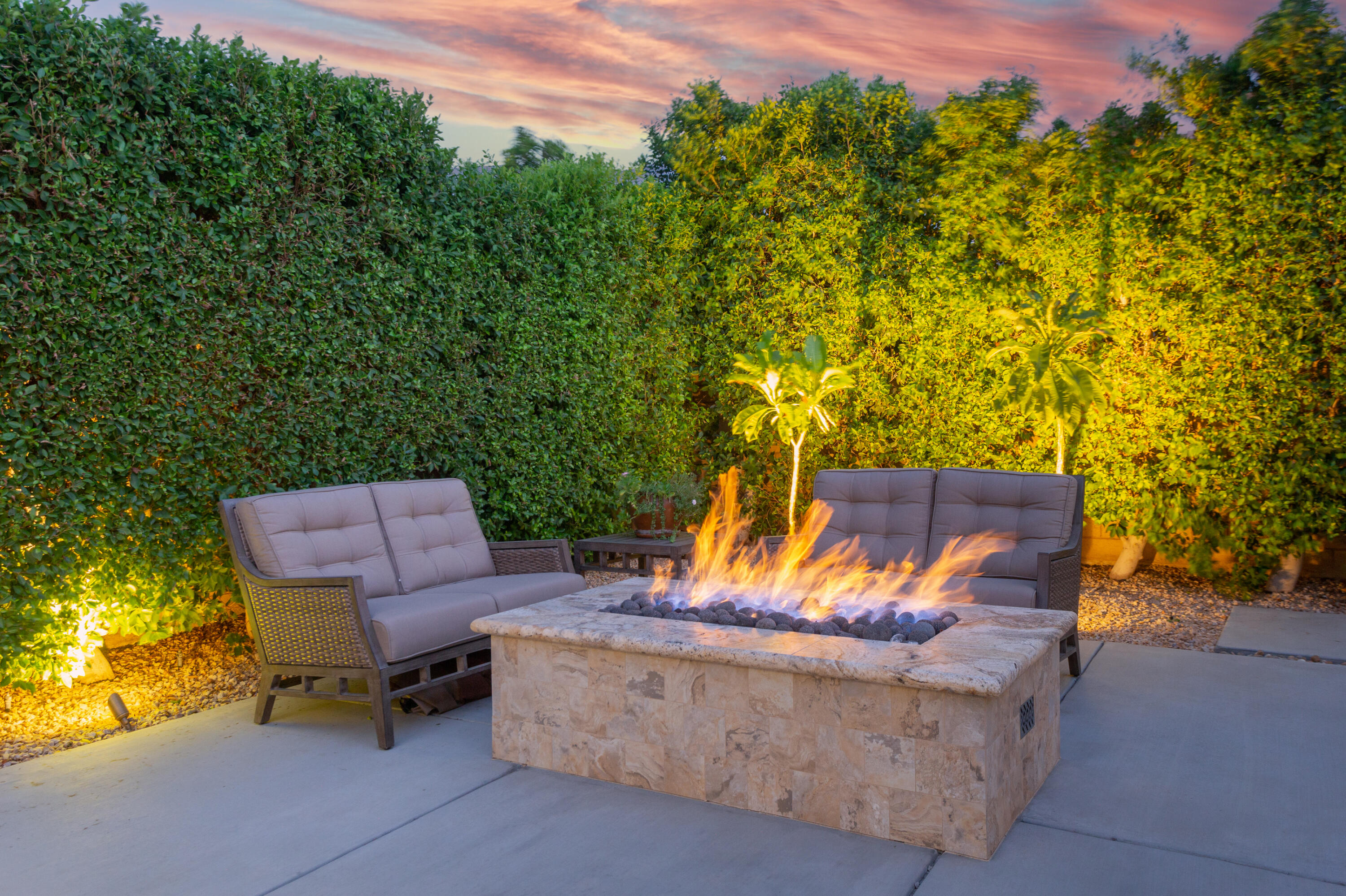 79120 Shadow Trail La Quinta, CA 92253 - Photo 8 of 60 a backyard of a house with table and chairs