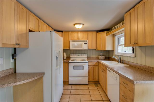 477 Franklin Limestone Road Nashville, TN 37217 - Photo 6 of 19 Updated Kitchen with good cabinet space and tile floors.