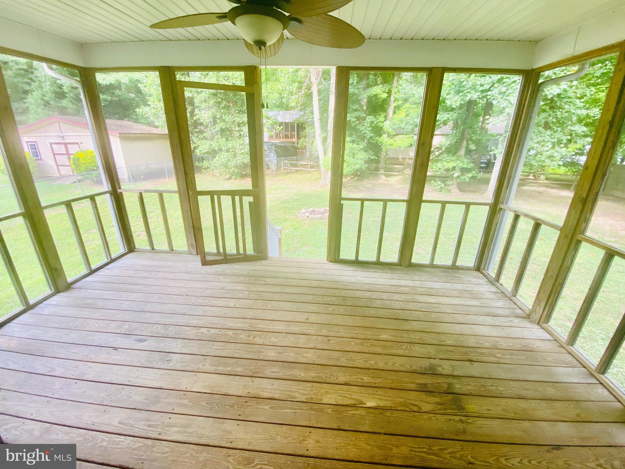 11579 Ropeknot Road Lusby, MD 20657 - Photo 15 of 20 Screened in Back Deck!