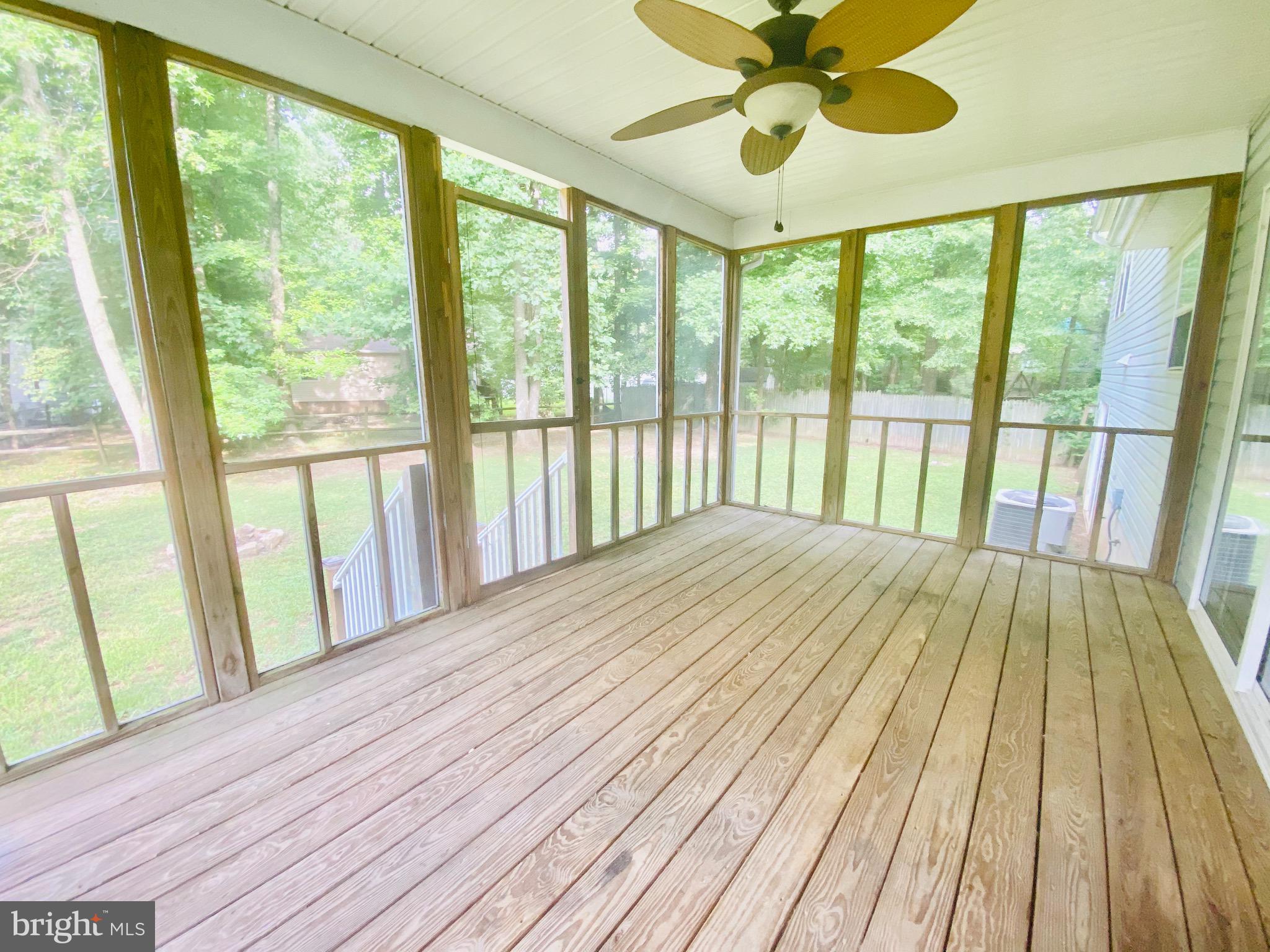 11579 Ropeknot Road Lusby, MD 20657 - Photo 16 of 20 Sceened in Back Deck!