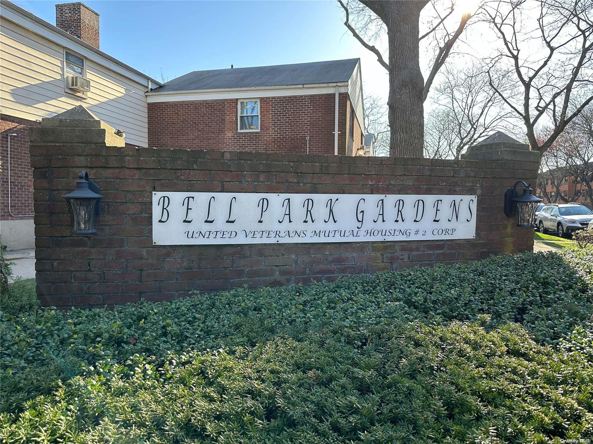 67-32 218th Street, Unit LOWR Queens, NY 11364 - Photo 1 of 1 a sign on the side of a building