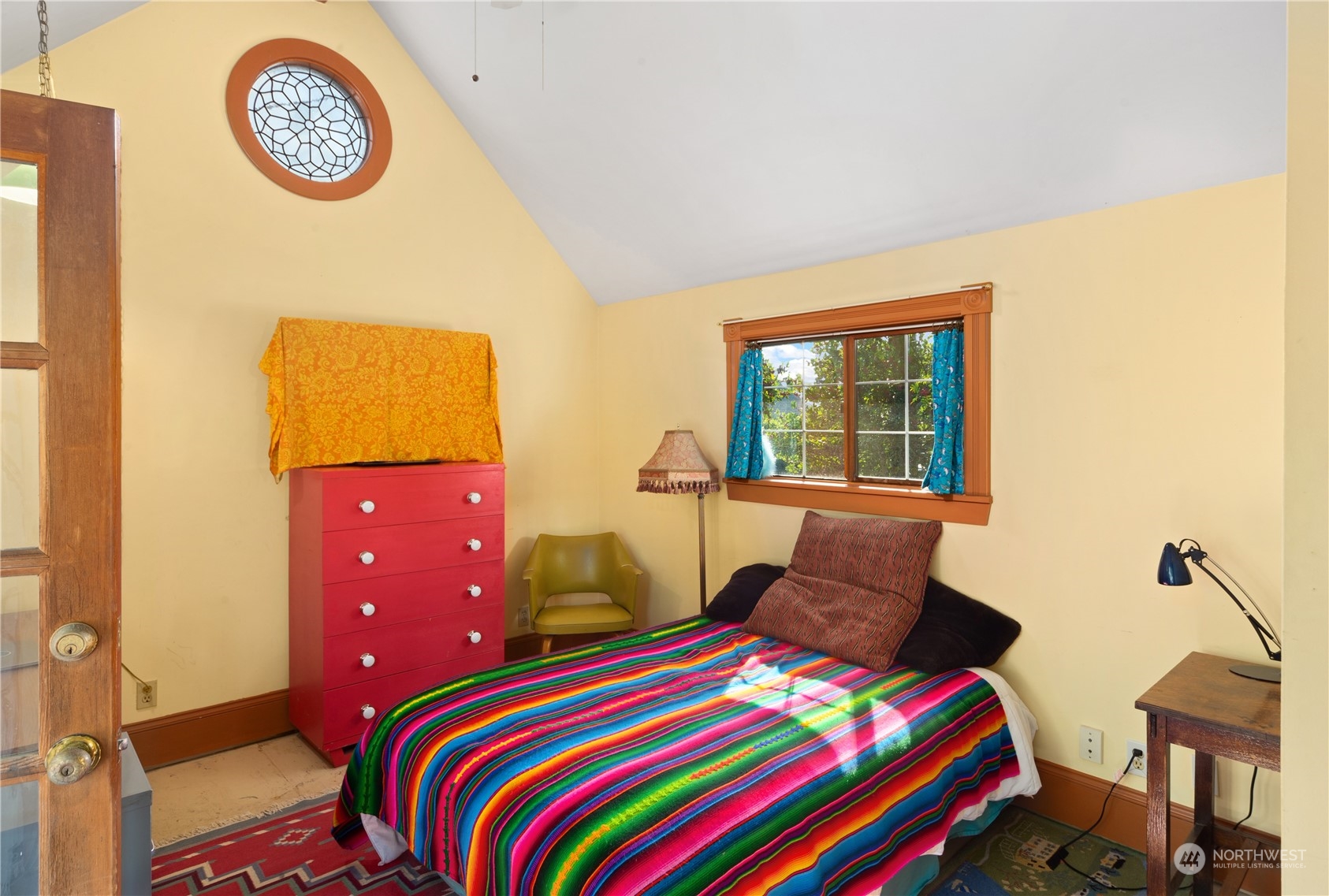 1441 Clay Street Port Townsend, WA 98368 - Photo 13 of 26 a bedroom with a bed and a window