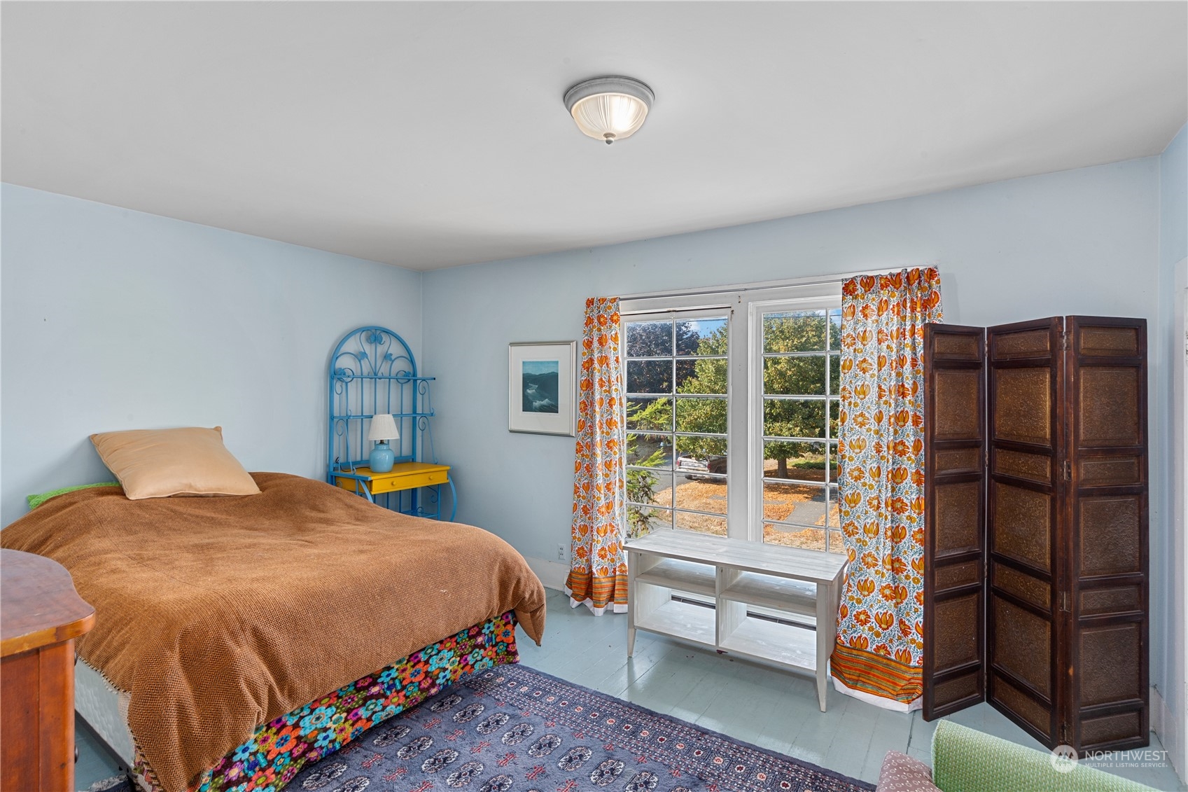 1441 Clay Street Port Townsend, WA 98368 - Photo 18 of 26 a bedroom with a bed and a window