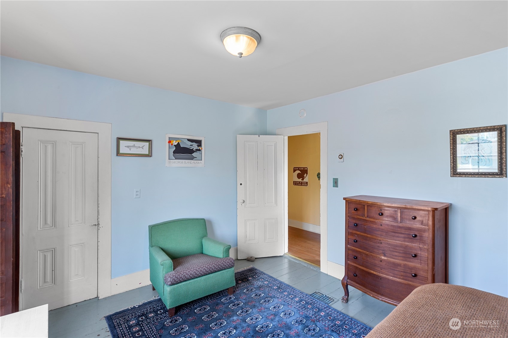 1441 Clay Street Port Townsend, WA 98368 - Photo 19 of 26 a living room with furniture and a dresser