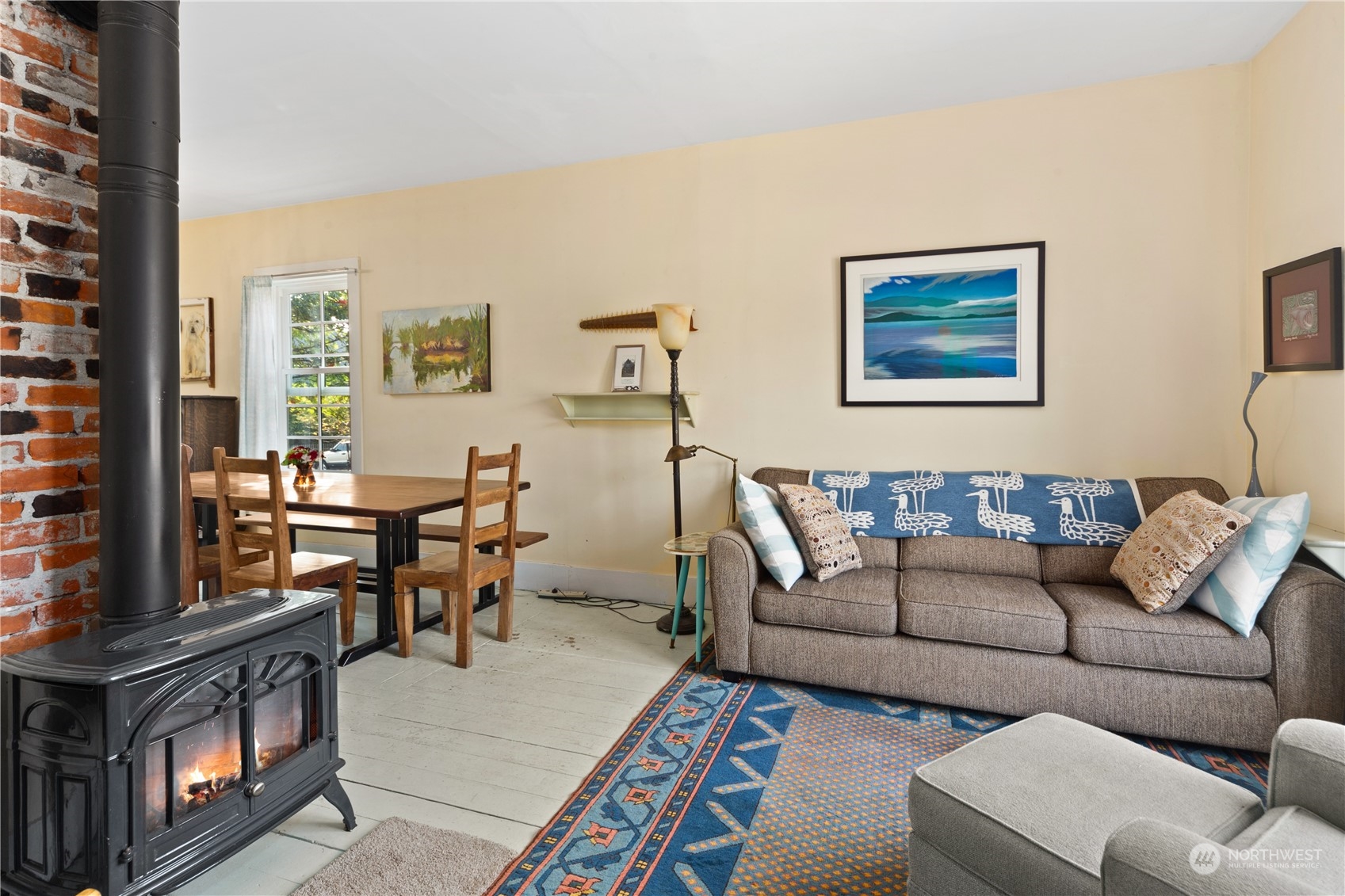 1441 Clay Street Port Townsend, WA 98368 - Photo 6 of 26 a living room with furniture a rug and a window