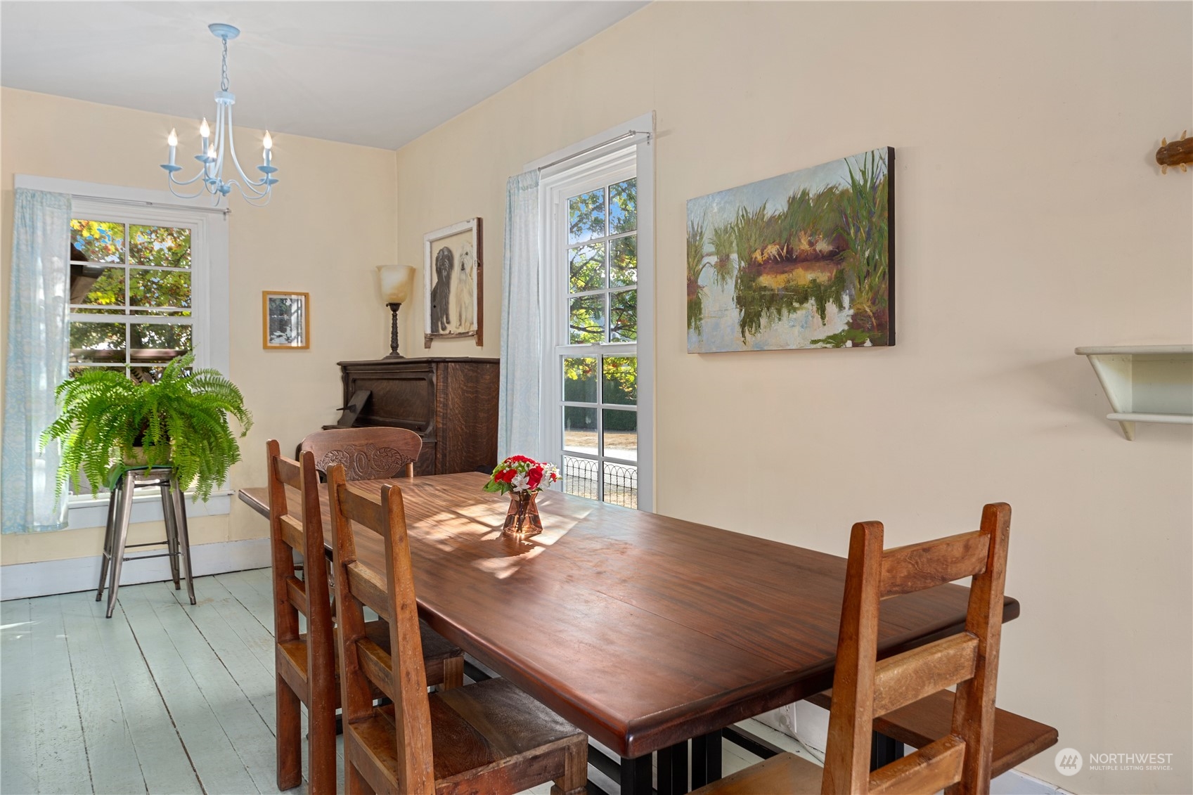1441 Clay Street Port Townsend, WA 98368 - Photo 7 of 26 a view of a dining room with furniture window and wooden floor