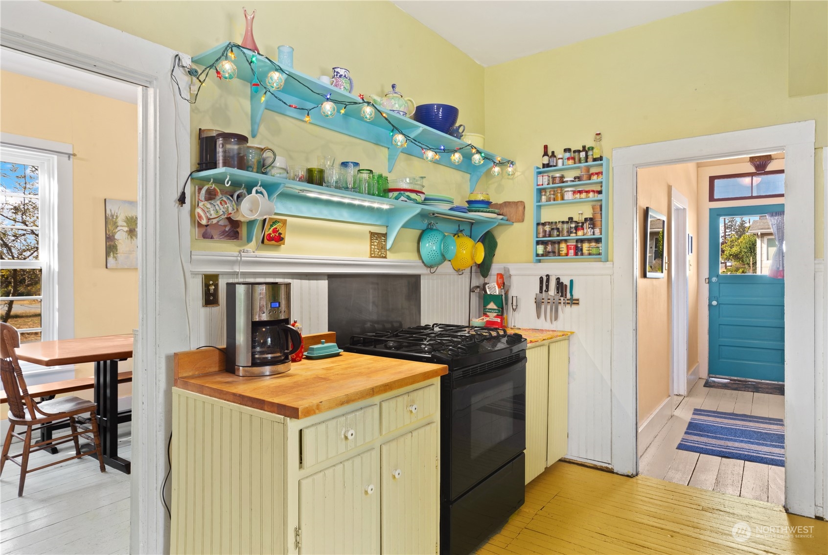 1441 Clay Street Port Townsend, WA 98368 - Photo 9 of 26 a kitchen that has a lot of cabinets in it