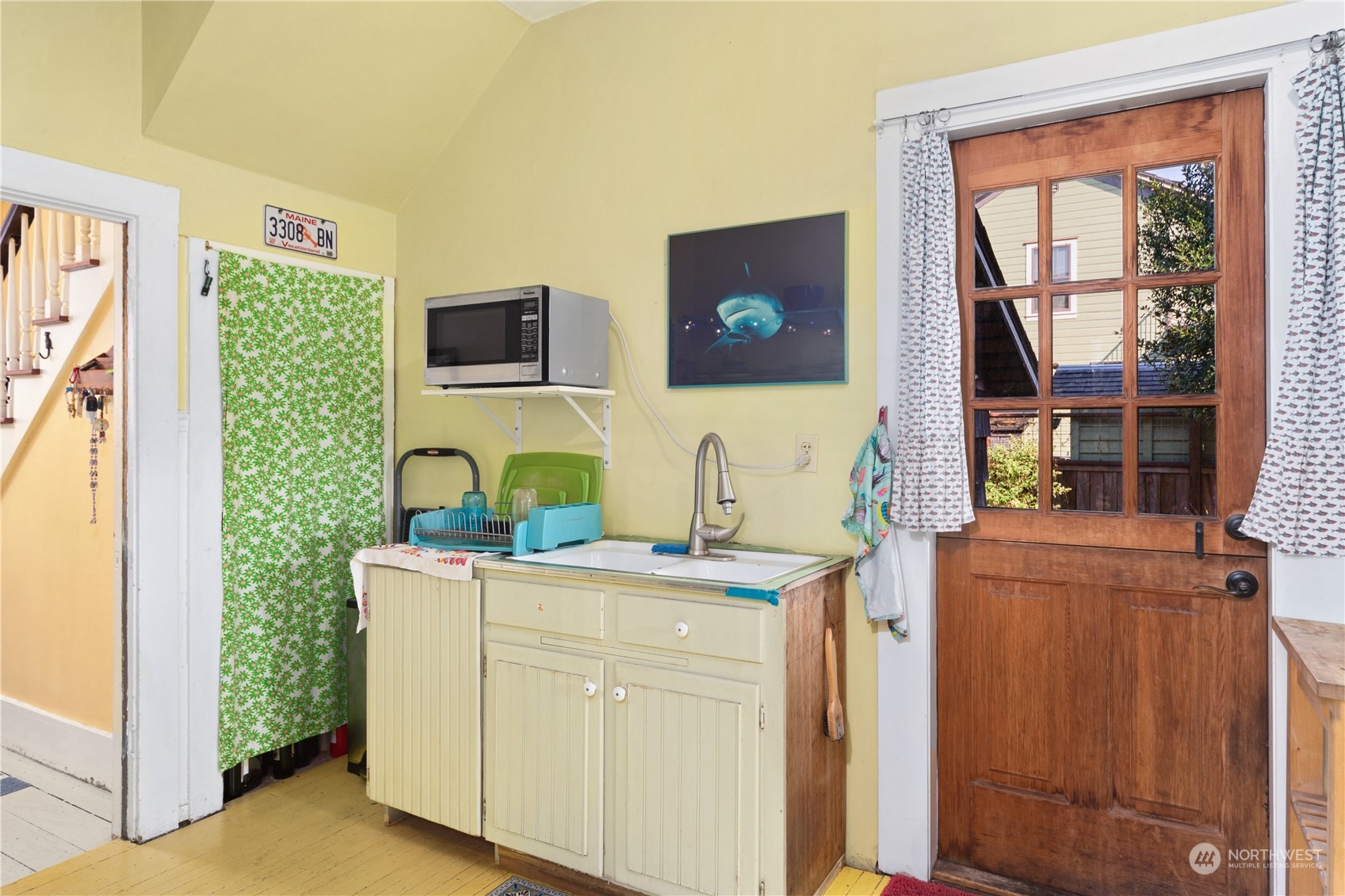1441 Clay Street Port Townsend, WA 98368 - Photo 10 of 26 a kitchen with a sink and a stove top oven