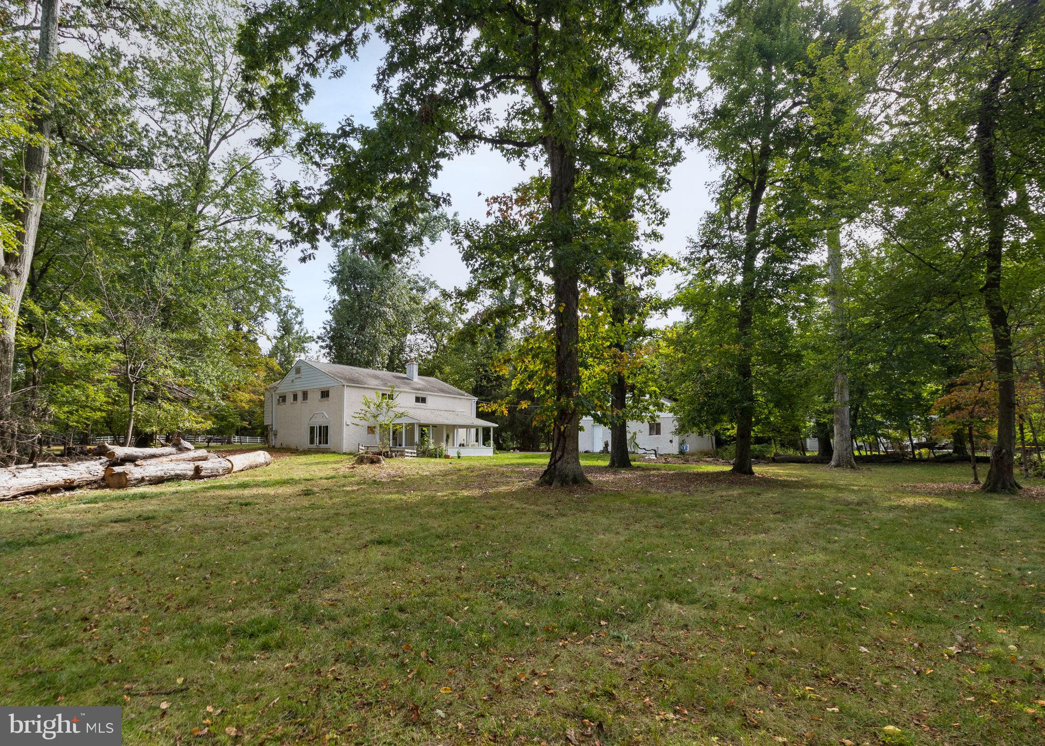 601 Cathcart Road Blue Bell, PA 19422 - Photo 33 of 38 a big room with trees and a big yard
