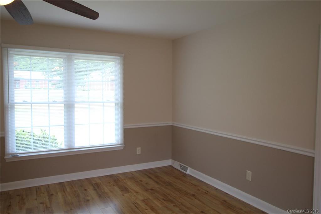 1715 Carmel Church Road, Unit 2 Monroe, NC 28112 - Photo 9 of 19 an empty room with a window