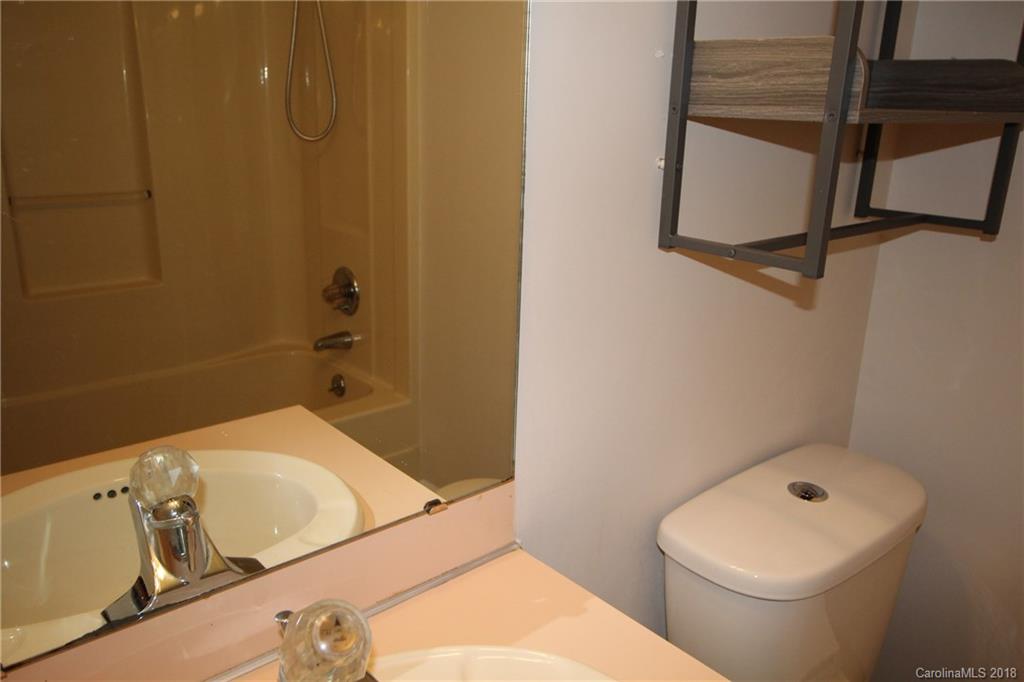 1715 Carmel Church Road, Unit 2 Monroe, NC 28112 - Photo 10 of 19 a bathroom with a sink and toilet