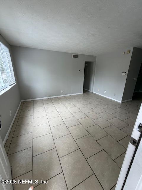 3048 Belden Street, Unit 5 Jacksonville, FL 32207 - Photo 4 of 7 a view of an empty room and window
