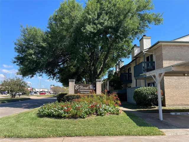 a view of a house with a big yard