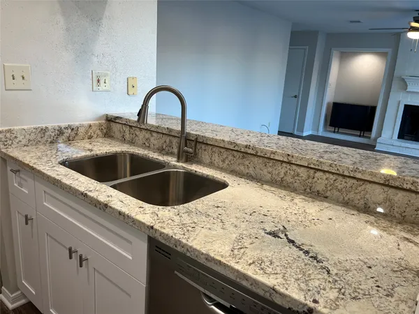 a close view of a sink and tap