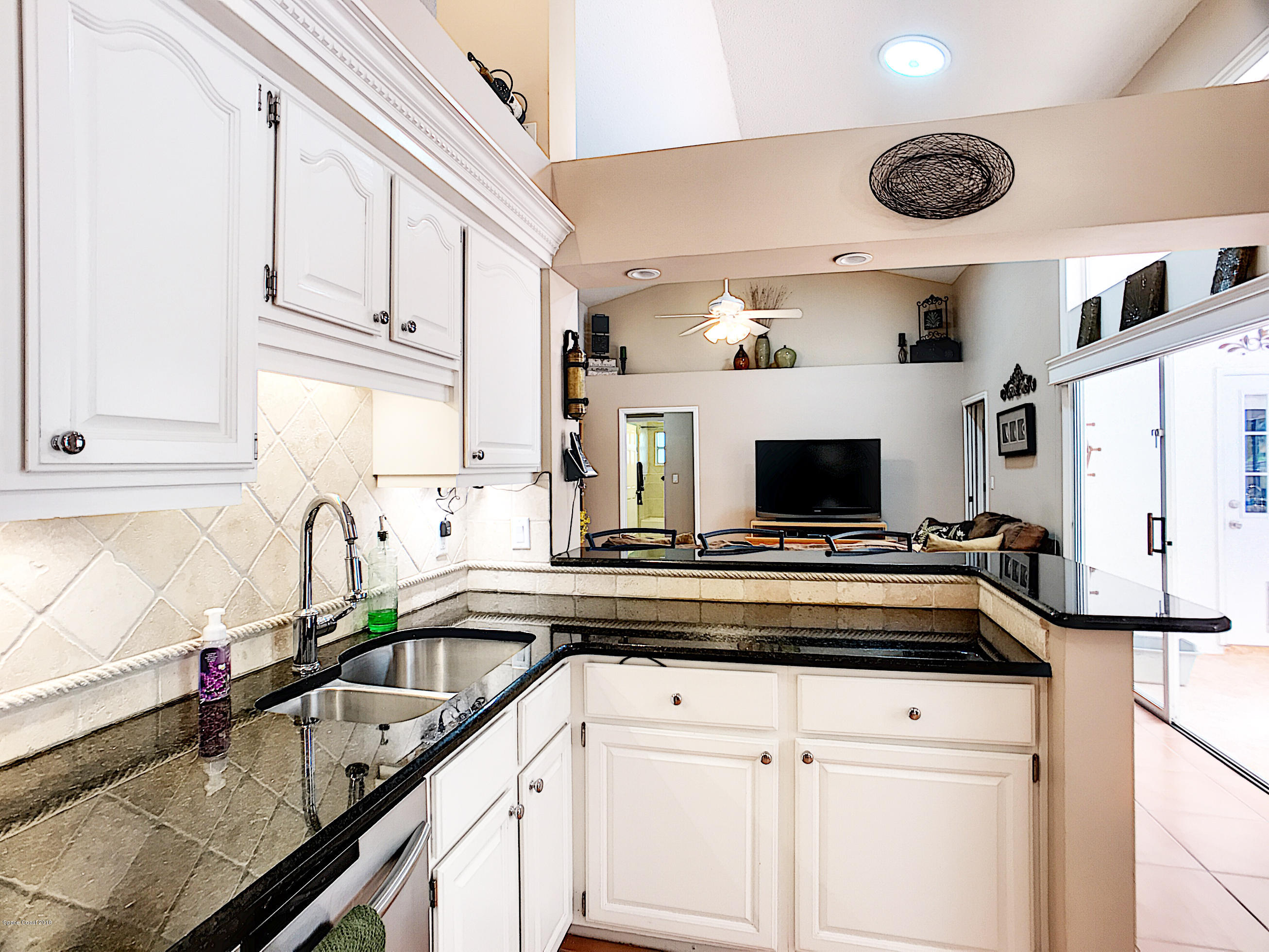 301 Lake Road Lake Mary, FL 32746 - Photo 35 of 47 Kitchen to Family Room
