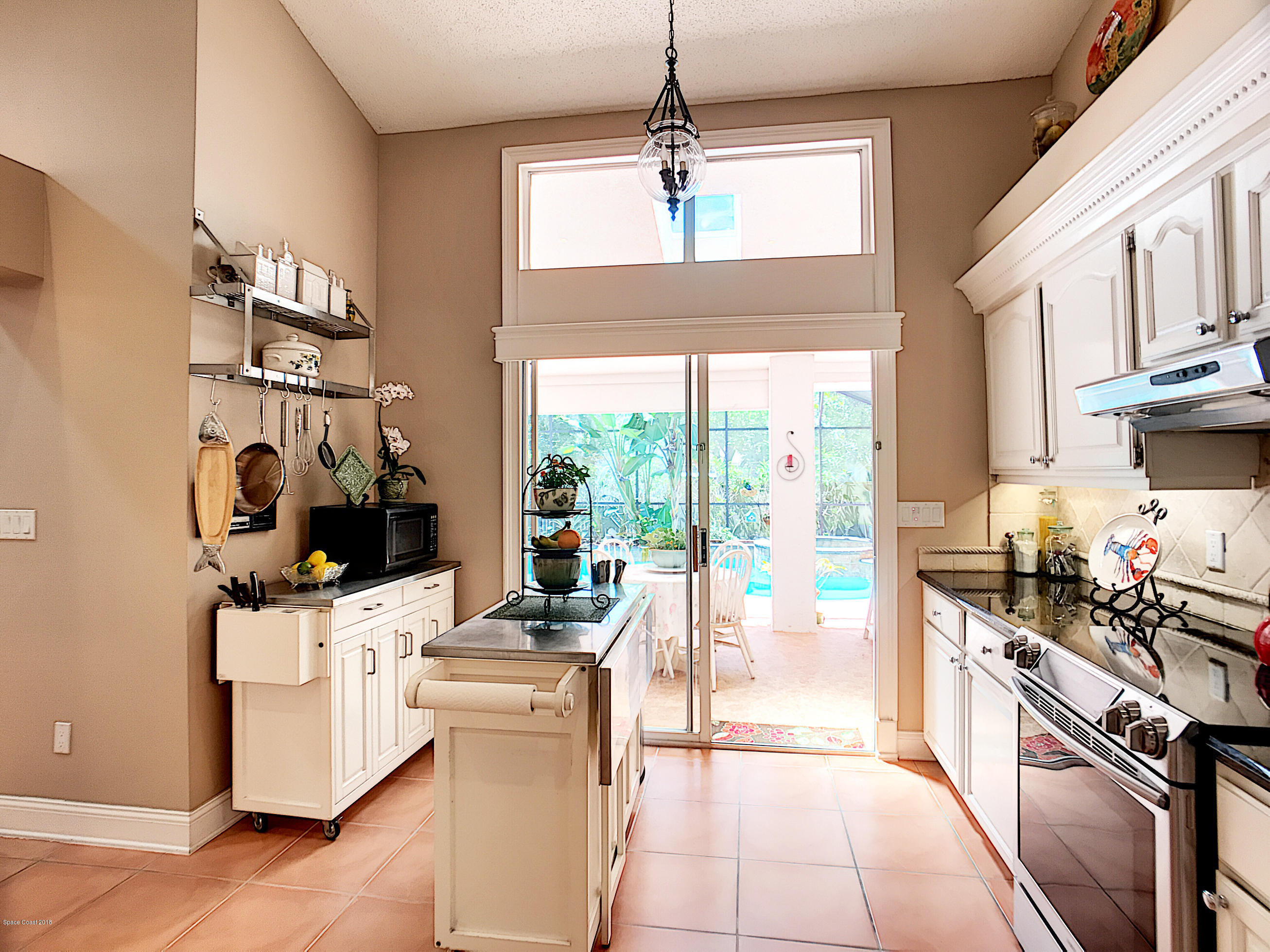 301 Lake Road Lake Mary, FL 32746 - Photo 36 of 47 Kitchen view of pool