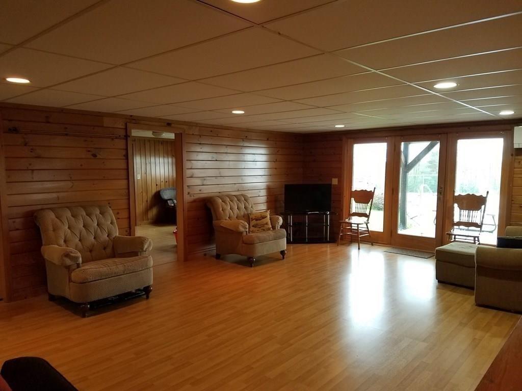 57 Howe Road Fairfield, ME 04937 - Photo 18 of 22 Finished family room with access to pool