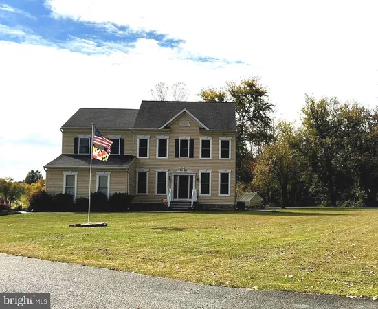a front view of a house with swimming pool