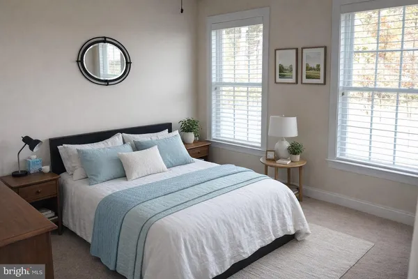 a bedroom with bed and a window