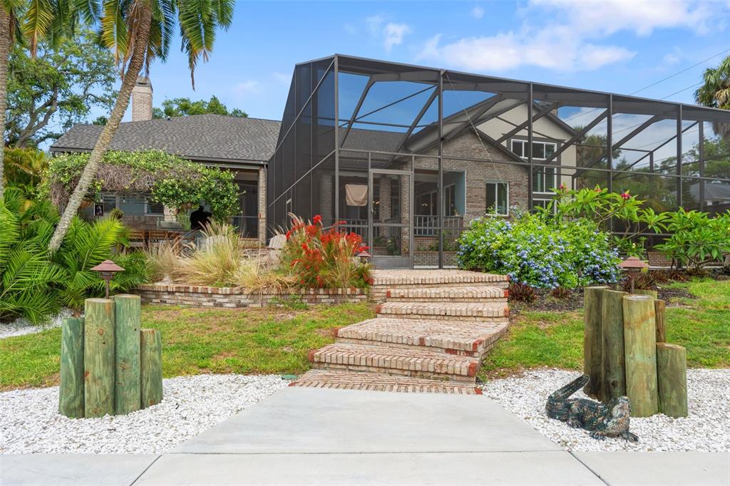 6936 River Road New Port Richey, FL 34652 - Photo 79 of 93 a front view of a house with garden
