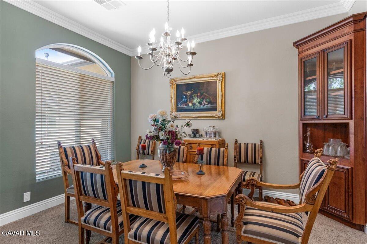 23840 Martingale Way Tehachapi, CA 93561 - Photo 8 of 63 a view of a dining room with furniture window and outside view