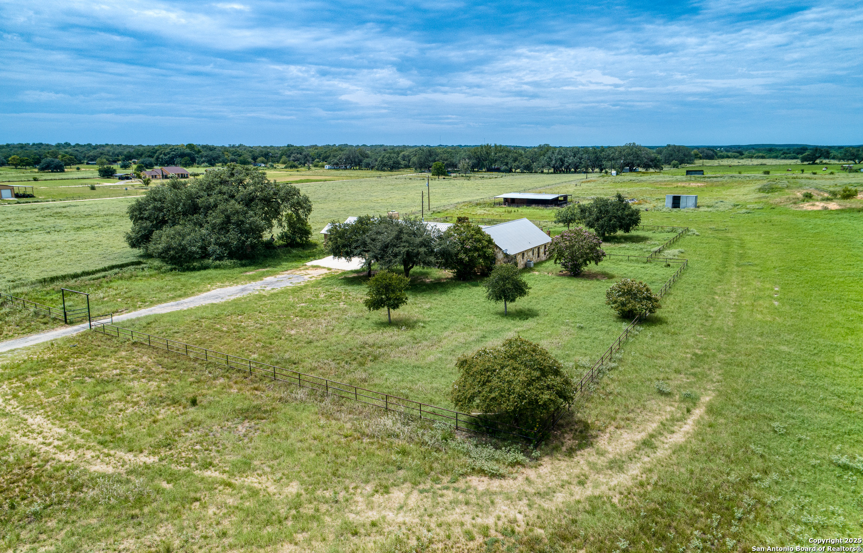 870 County Road 761 Devine, TX 78016 - Photo 25 of 34 a view of lake with houses
